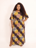 Vestido Savana amarelo estampado plus size visto de frente